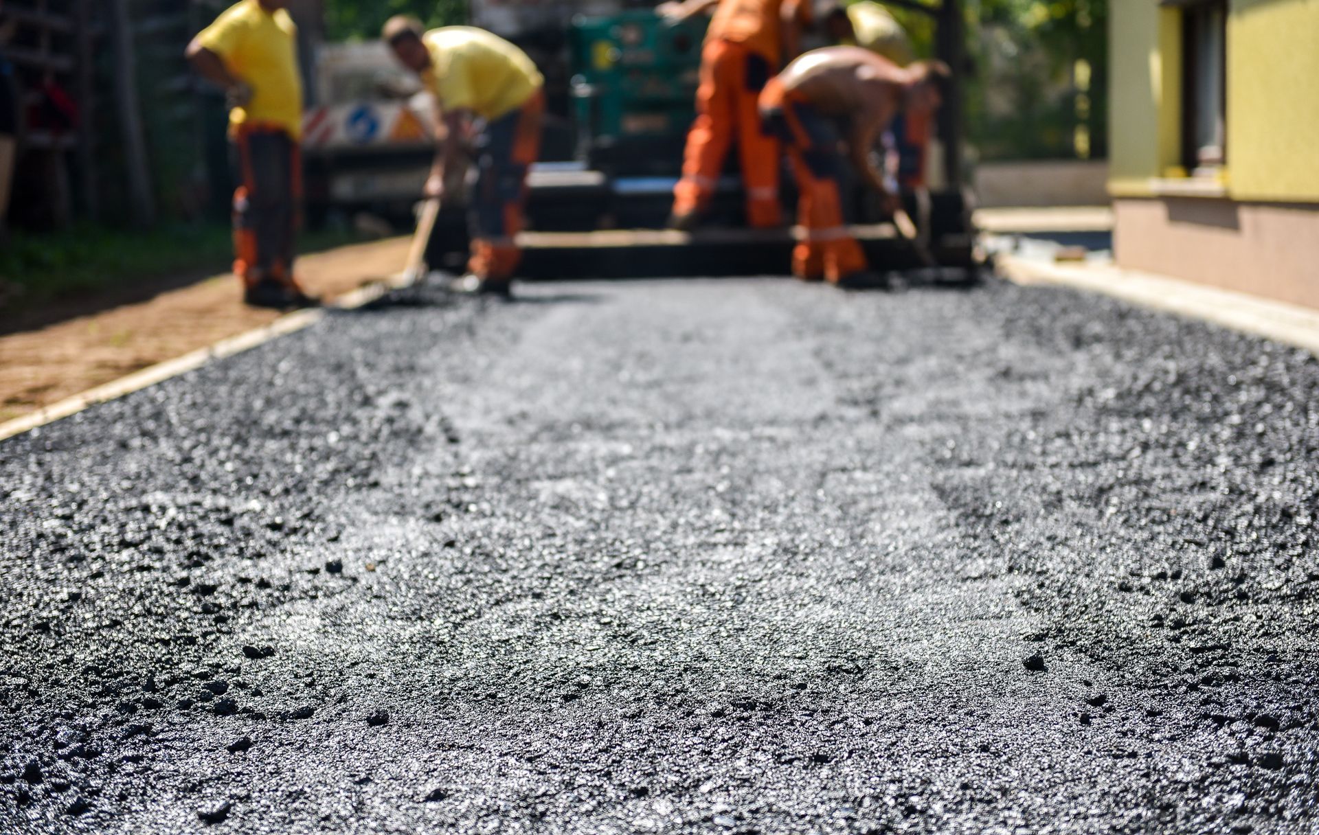 Team of Workers from Dependable Paving Co., Inc. offering a residential paving service.